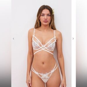 NWT FOR LOVE AND LEMONS 
Beaming Butterfly Applique Thong
Size: XXS